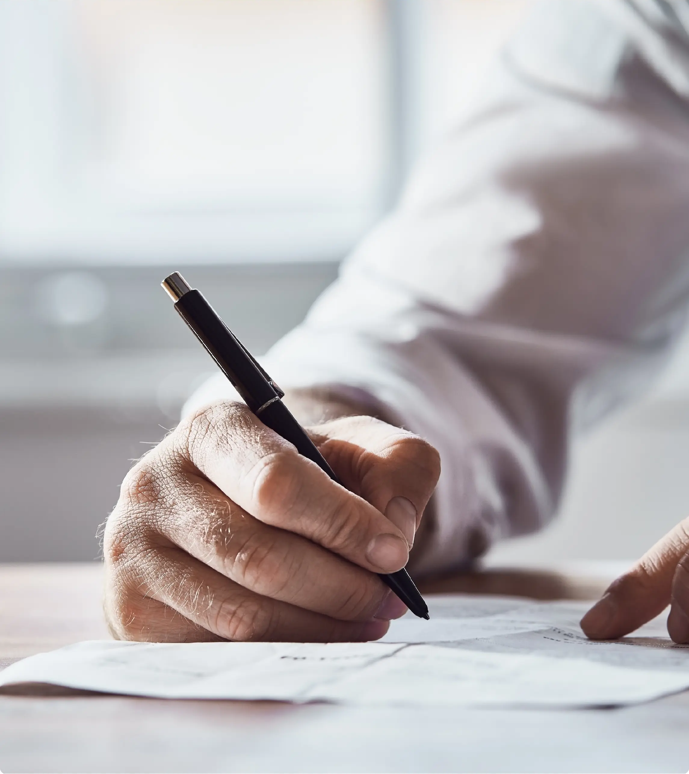 Man writing on paper